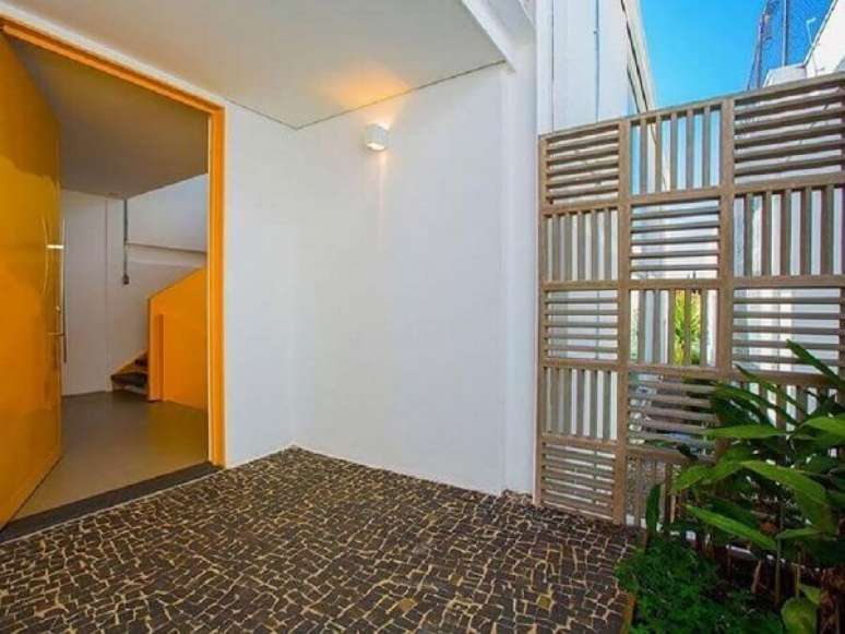 41. Muros decorados com cobog&oacute; de concreto &eacute; o mais utilizado em &aacute;reas externas. Fonte: Yta Arquitetura