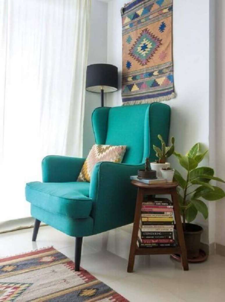 45. Decoração simples com modelo clássico de poltrona para leitura – Foto: Pinterest