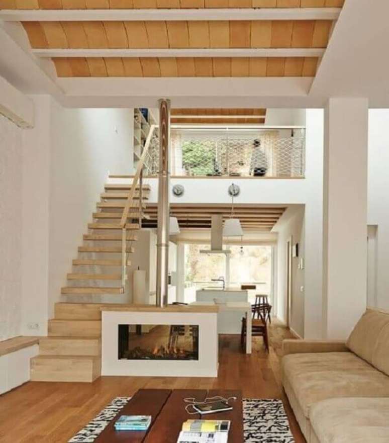 69. Projeto de casa de madeira com mezanino decorado com estilo rústico. Fonte: Pinterest