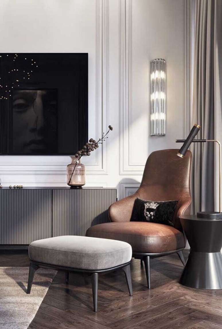 57. Sala cinza moderna decorada com poltrona de couro para leitura – Foto: Architecture Art Designs