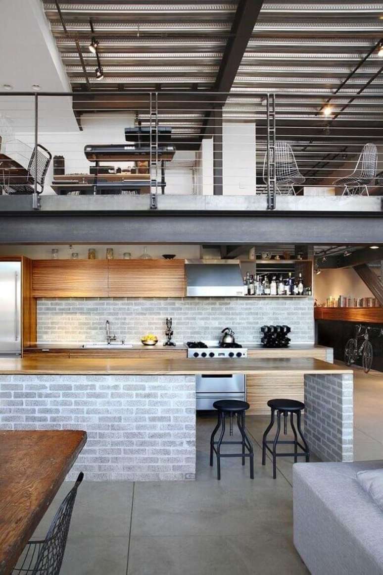 49. Tijolinho cinza para decoração de cozinha estilo industrial com ilha – Foto: Pinterest