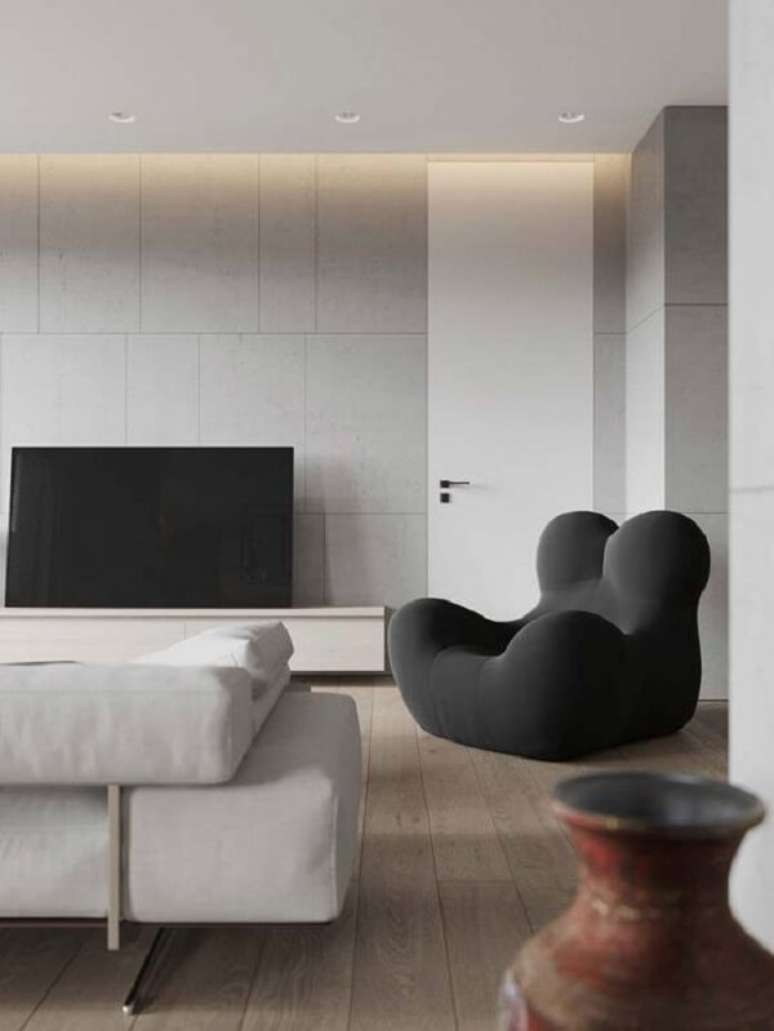 40. Modelo de revestimento de parede porcelanato clean decora a sala. Fonte: Pinterest