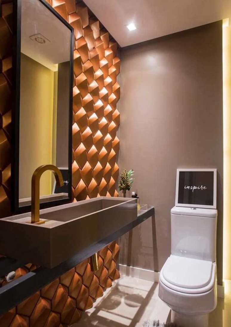 81. O revestimento de parede 3D colorido se destaca na decoração do banheiro. Fonte: Pinterest