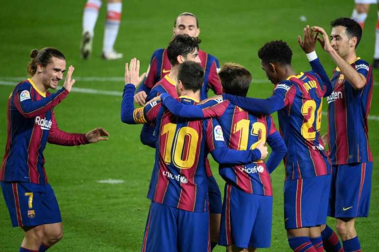 O time de Messi vive boa fase no Campeonato Espanhol e recebe o PSG em casa (Foto:LLUIS GENE / AFP)