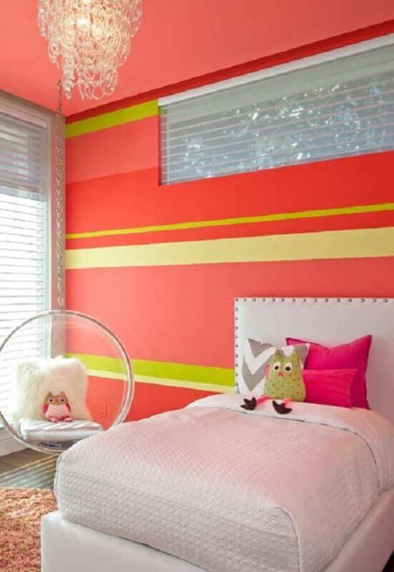 26. Decoração de quarto para criança com parede laranja e amarela – Foto: Pinterest