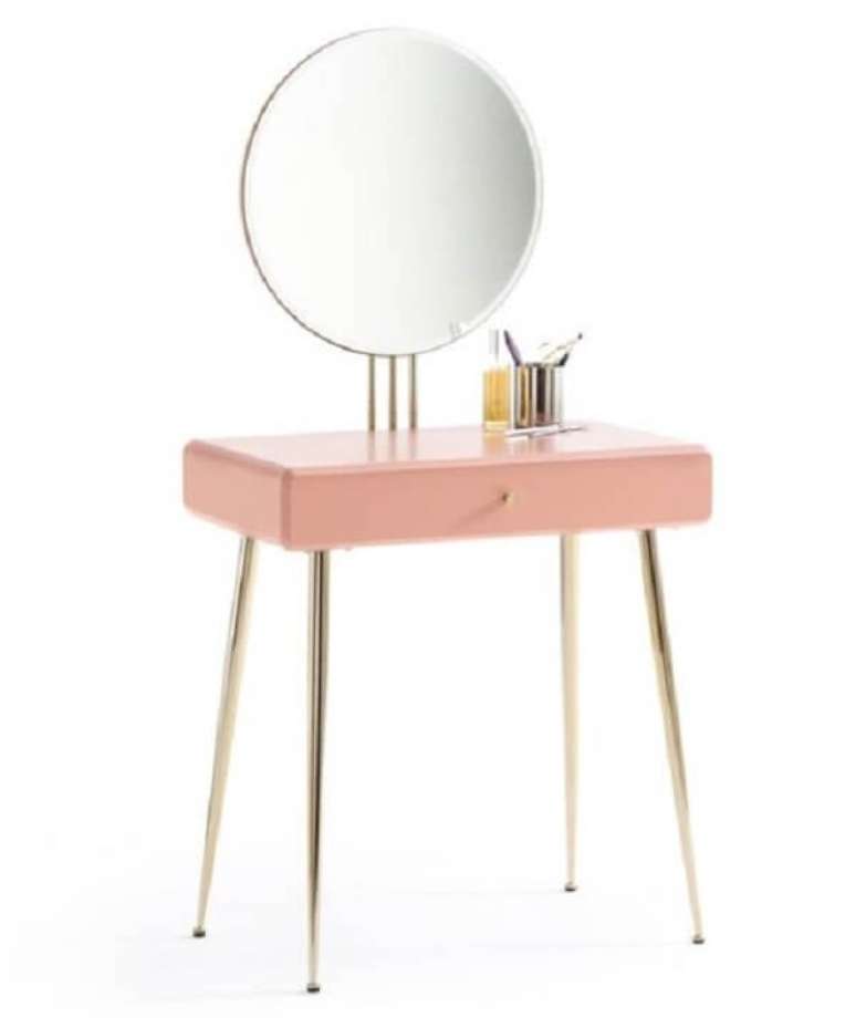 20. Mini penteadeira rosa com espelho se adapta a diferentes ambientes. Fonte: Pinterest
