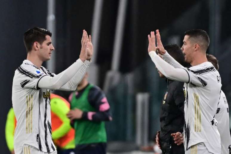 Morata e Cristiano Ronaldo fazem dupla na Juventus (Foto: MIGUEL MEDINA / AFP)