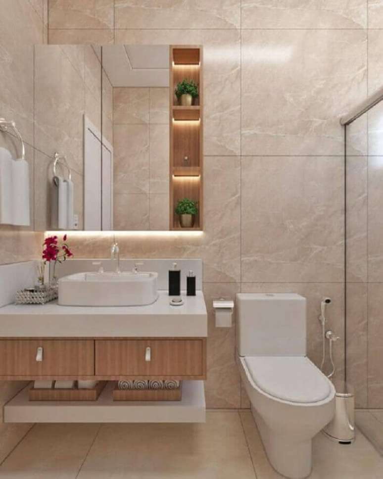31. Decoração em cores neutras com espelheira para banheiro planejado – Foto Histórias de Casa