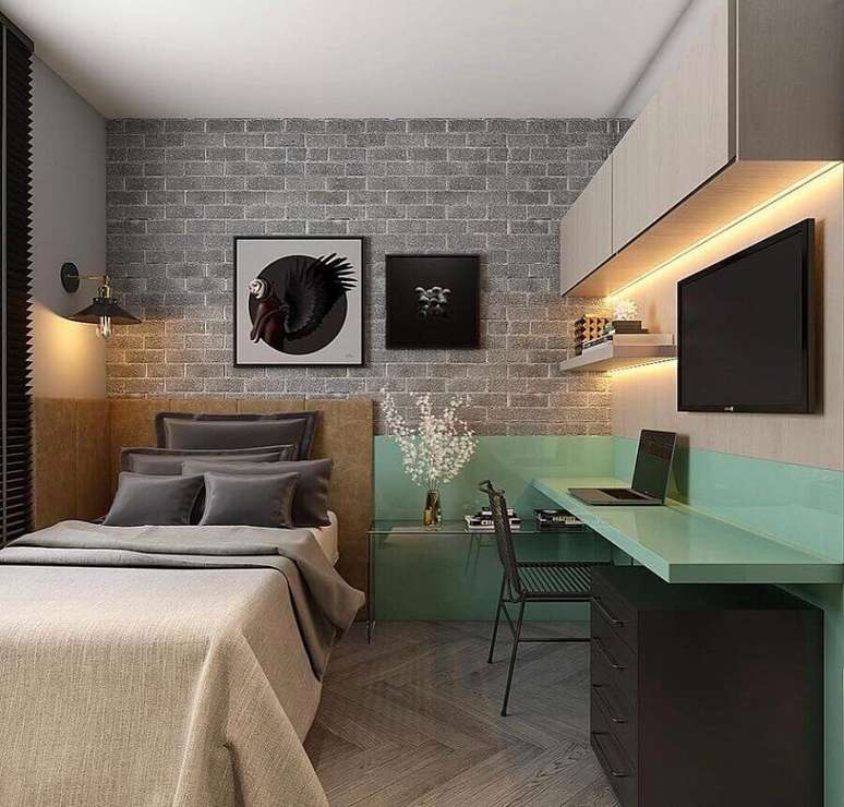 44. Decora&ccedil;&atilde;o moderna com escrivaninha planejada para home office no quarto de solteiro. Foto: Houzz