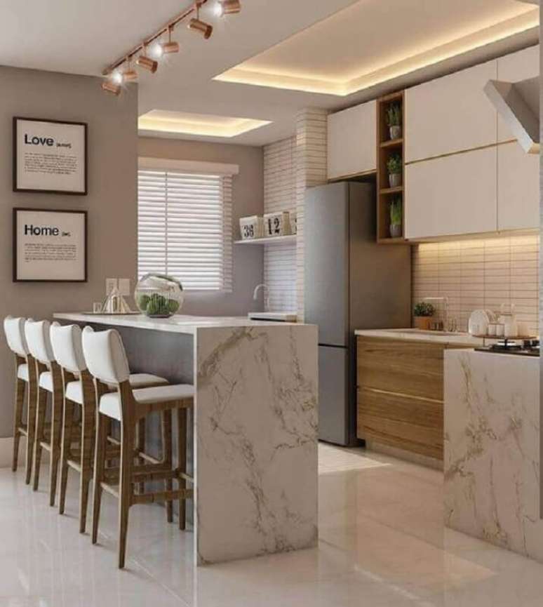 25. Bancada de m&aacute;rmore para decora&ccedil;&atilde;o de cozinha planejada &ndash; Foto Decor Salteado