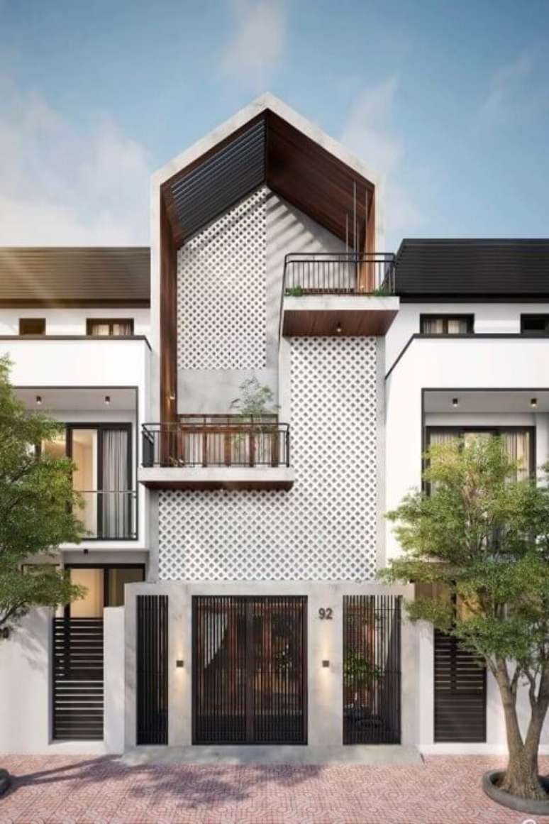43. Port&atilde;o de ferro preto em casa com design diferente. Foto de Pinterest
