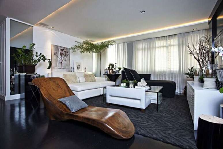 43. Decoração de sala de estar moderna com piso vinilico preto – Foto Futurist Architecture