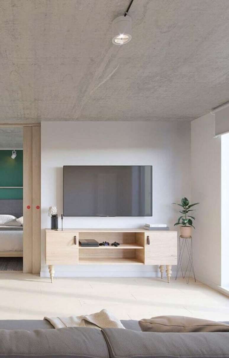 38. Rack pe palito de madeira na sala chique &ndash; Foto Revista Vd