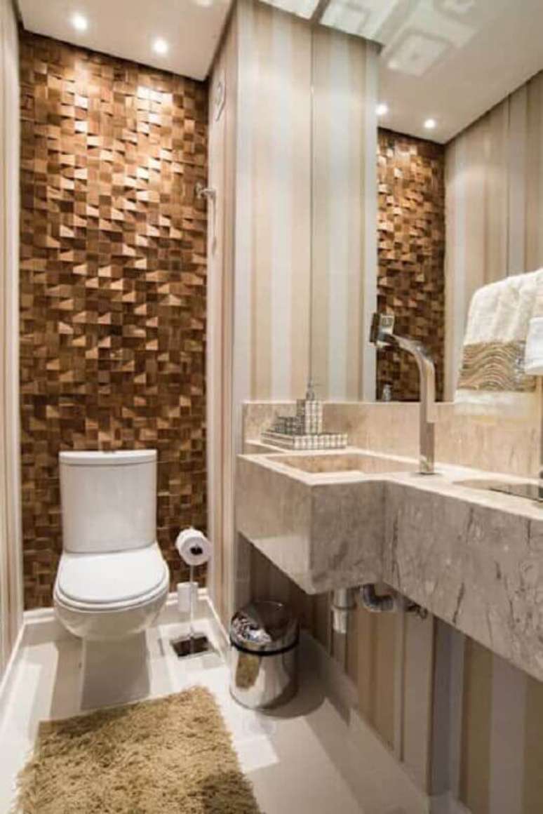 7. Banheiro social decorado com revestimento 3D – Foto: Homify