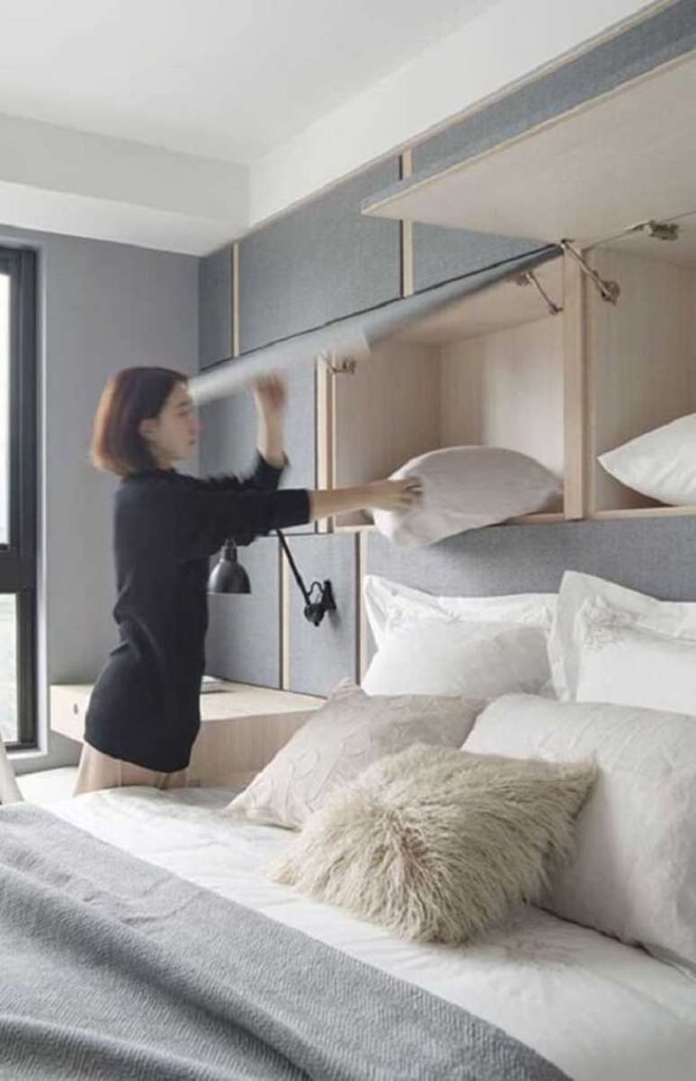 7. Aproveite todos os espaços do dormitório e invista no armário basculante. Fonte: Pinterest