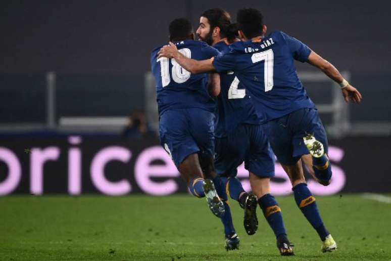 Porto conseguiu classificação emocionante diante da Juventus nas oitavas de final (Foto: MARCO BERTORELLO / AFP)