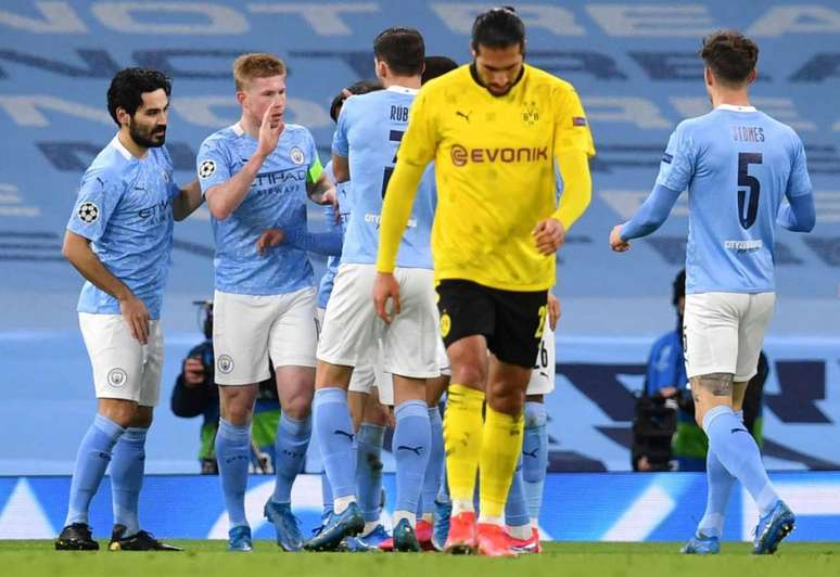 Manchester City pode ser o primeiro clube inglês a vencer quatro títulos em uma temporada (Foto: PAUL ELLIS / AFP)