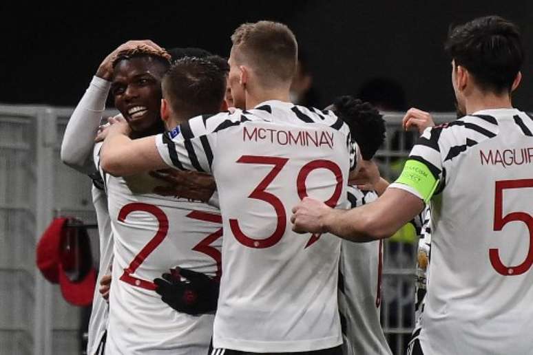 Nas oitavas de final, Manchester United derrotou o Milan (Foto: MARCO BERTORELLO / AFP)