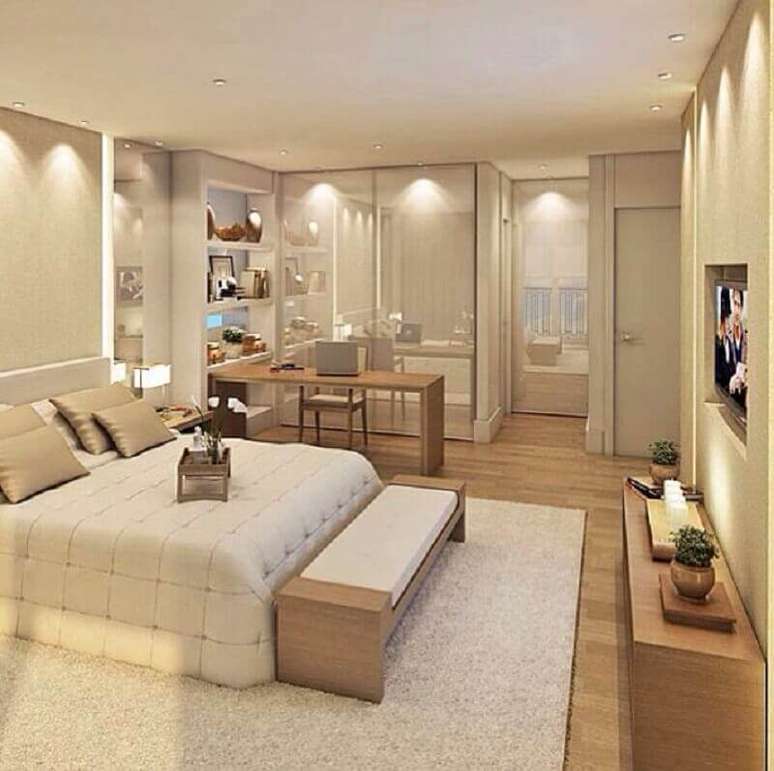 32. Banco de madeira para decora&ccedil;&atilde;o de quarto de casal bege amplo &ndash; Foto: Pinterest