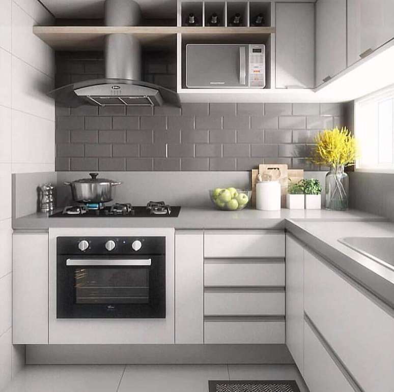 1. Decoração com revestimento cinza para cozinha planejada de canto – Foto: Pinterest