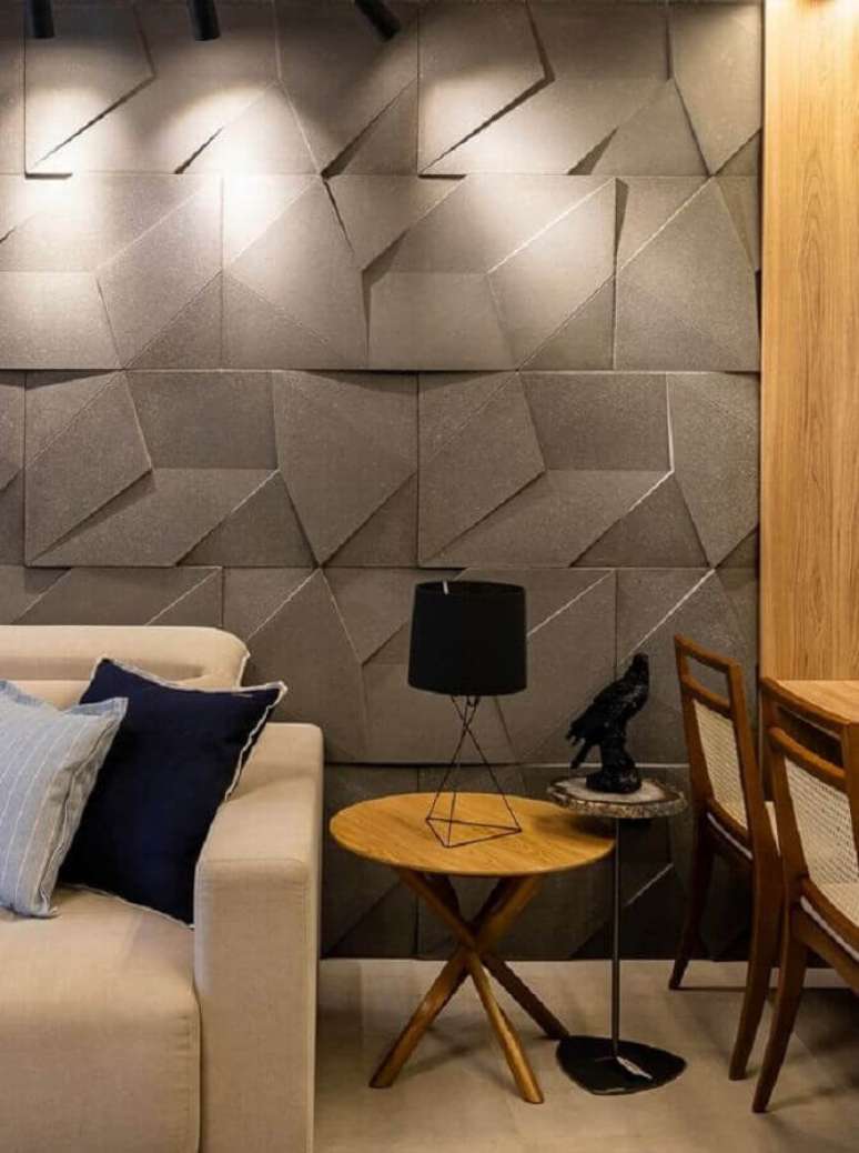 35. Decora&ccedil;&atilde;o de sala de estar moderna com revestimento 3D cinza &ndash; Foto: Castelatto Pisos e Revestimentos