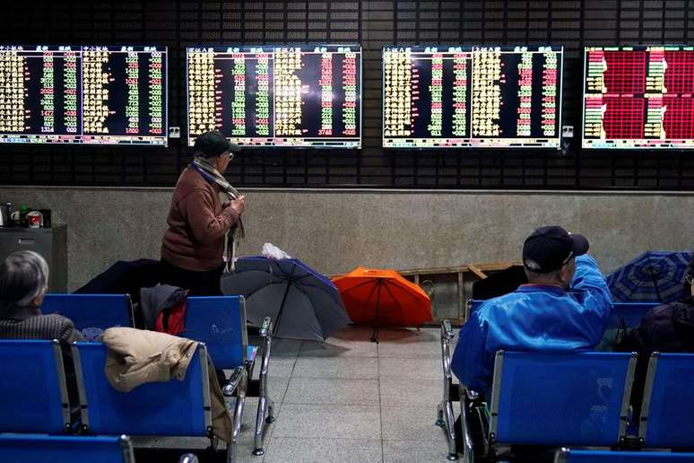 Corretora em Xangai. REUTERS/Aly Song