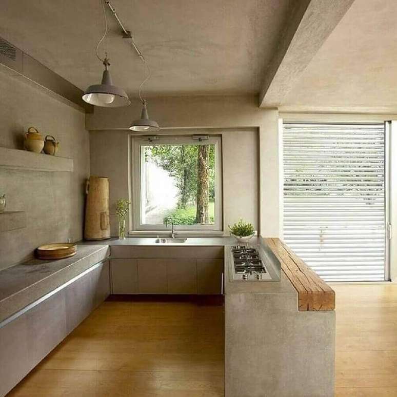 11. Decora&ccedil;&atilde;o de cozinha com balc&atilde;o de concreto e madeira &ndash; Foto: Pinterest