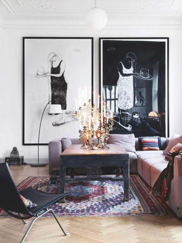 14. Decoração com quadro grande para sala de estar – Foto: Casa de Valentina