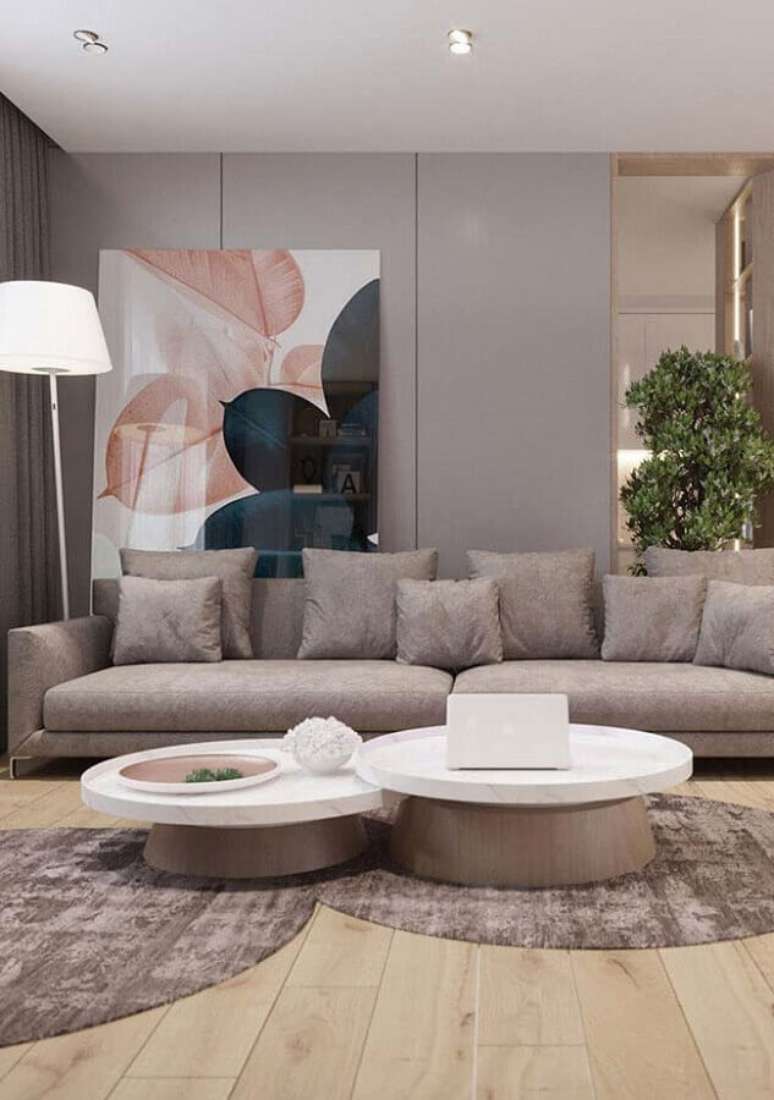 3. Decoração de sala cinza moderna com quadro grande – Foto: Home Fashion Trend