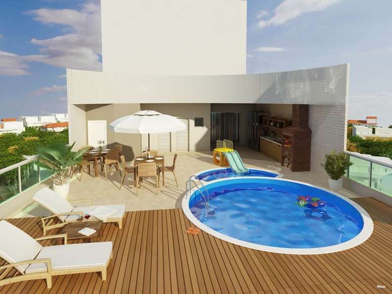 35. Casa com piscina redonda e deck de madeira. Fonte: Pinterest