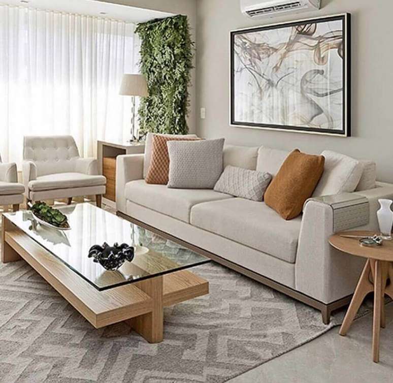 17. Decora&ccedil;&atilde;o em cores neutras com almofadas para sala bege &ndash; Foto: Pinterest