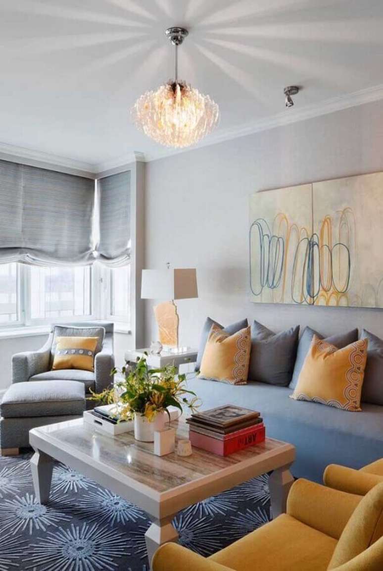 41. Almofadas para sala de estar decorada em tons de cinza e amarelo – Foto: Pinterest