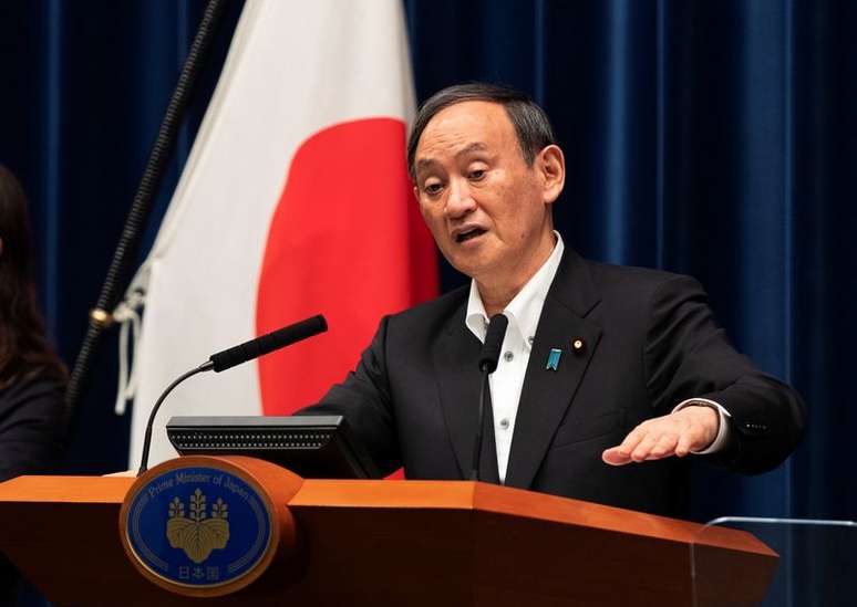 Primeiro-ministro do Japão, Yoshihide Suga, durante entrevista coletiva em Tóquio
07/05/2021 Hiro Komae/Pool via REUTERS