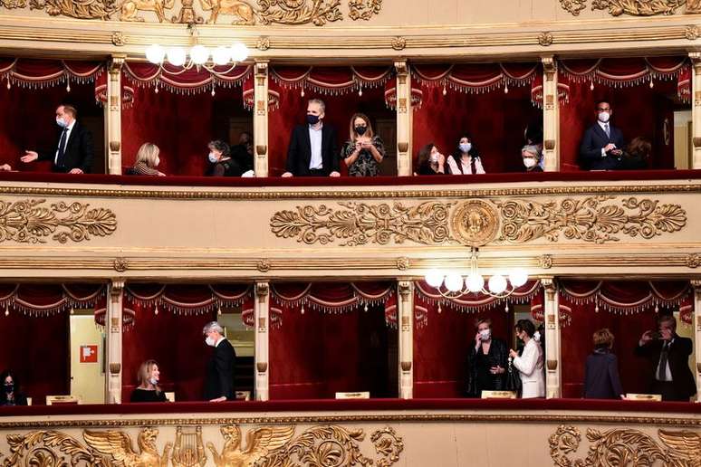 People attend the re-opening of La Scala opera house after it was closed due to the coronavirus disease (COVID-19) pandemic, in Milan, Italy, May 10, 2021. REUTERS/Flavio Lo Scalzo