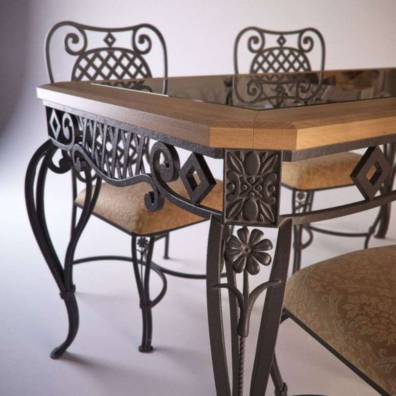 14. Mesa com p&eacute; de ferro e tampo de madeira &ndash; Foto Pinterest