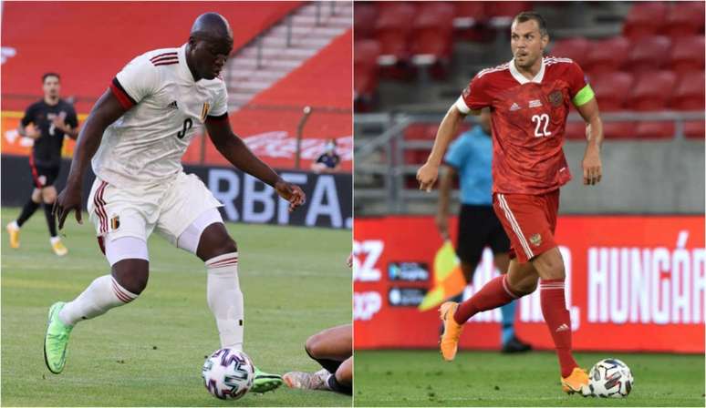 Lukaku e Dzyuba são os principais nomes de seus times (Foto: KENZO TRIBOUILLARD / AFP; ATTILA KISBENEDEK / AFP)