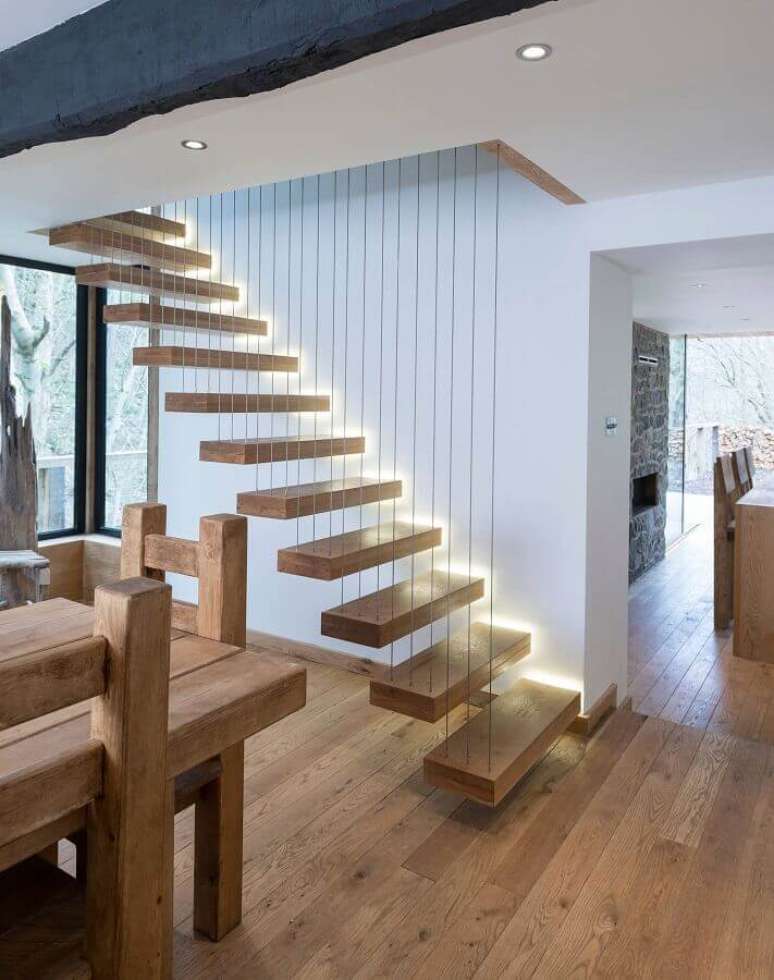 1. Casa decorada com escadas vazadas internas com estilo minimalista – Foto: Houzz