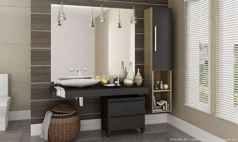 6. O gaveteiro preto com rodinhas se mistura a decoração do banheiro. Fonte: Pinterest