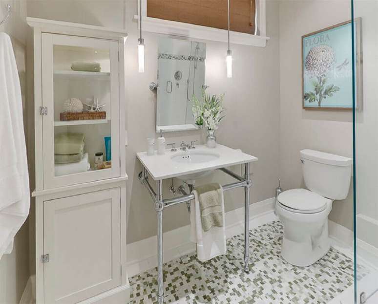 21. Decora&ccedil;&atilde;o de banheiro simples com cores neutras.