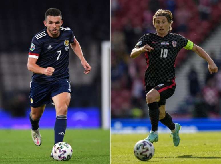 McGinn, da Escócia, e Modric, da Croácia, são destaques do jogo (Foto: ANDY BUCHANAN, PETR DAVID JOSEK / AFP)