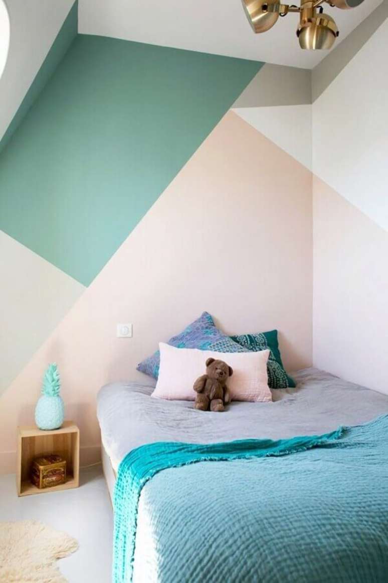 55. Cores pastéis para parede de quarto infantil com decoração simples – Foto: Archidea