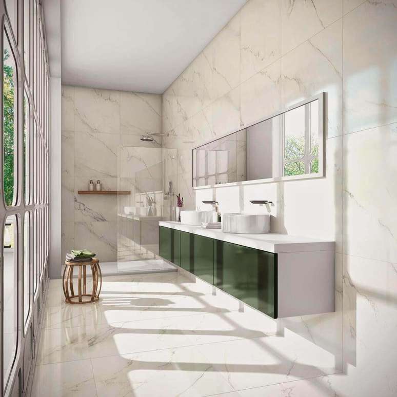 72. Banheiro com piso de porcelanato marmorizado e armario verde -Foto Pinterest