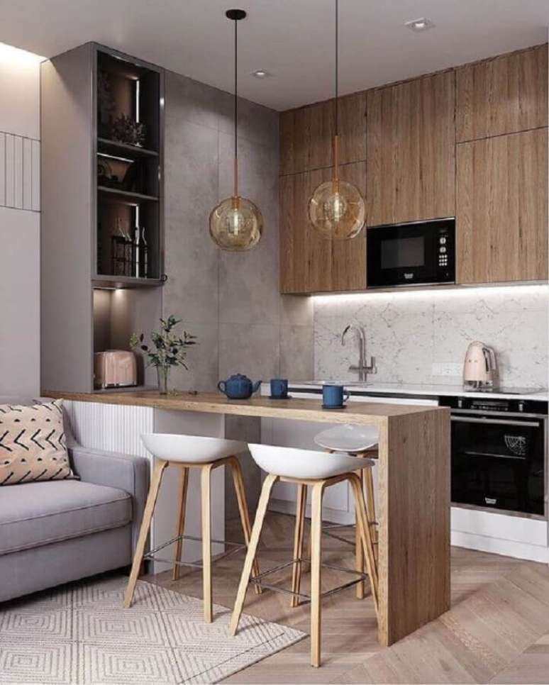 38. Cozinha estilo industrial moderna decorada com banqueta branca – Foto: Pinterest
