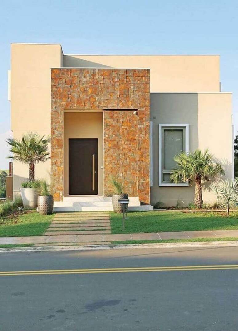 47. Invista em uma boa impermeabiliza&ccedil;&atilde;o da fachada das casas com revestimento externo em pedra ferro. Fonte: Pinterest