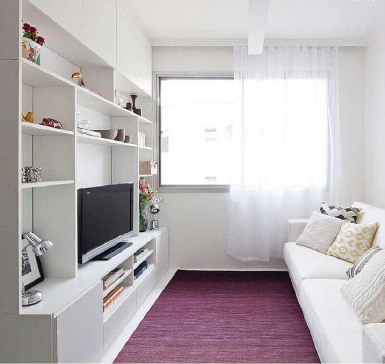 13. A cor branca ajuda a ampliar visualmente a decoração da sala de apartamento pequeno – Foto: Iná Arquitetura
