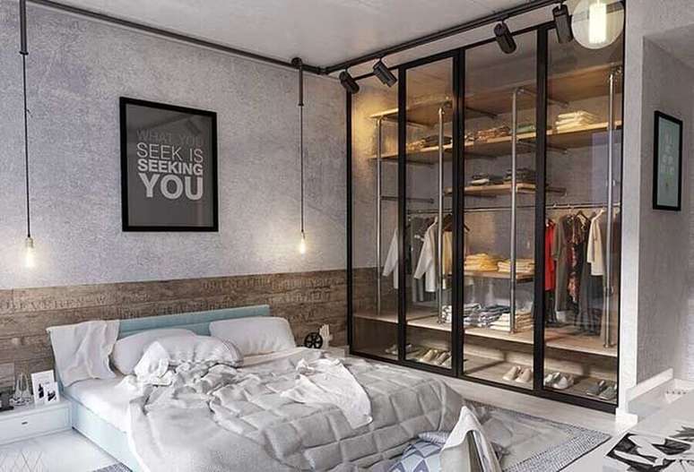 46. Quarto estilo industrial decorado com porta de vidro para closet – Foto: Pinterest
