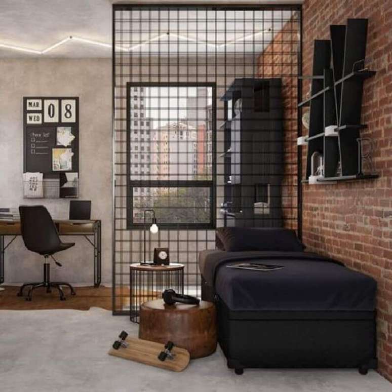 25. Estilo industrial para quarto de solteiro decorado com parede tijolinho – Foto: Arkpad