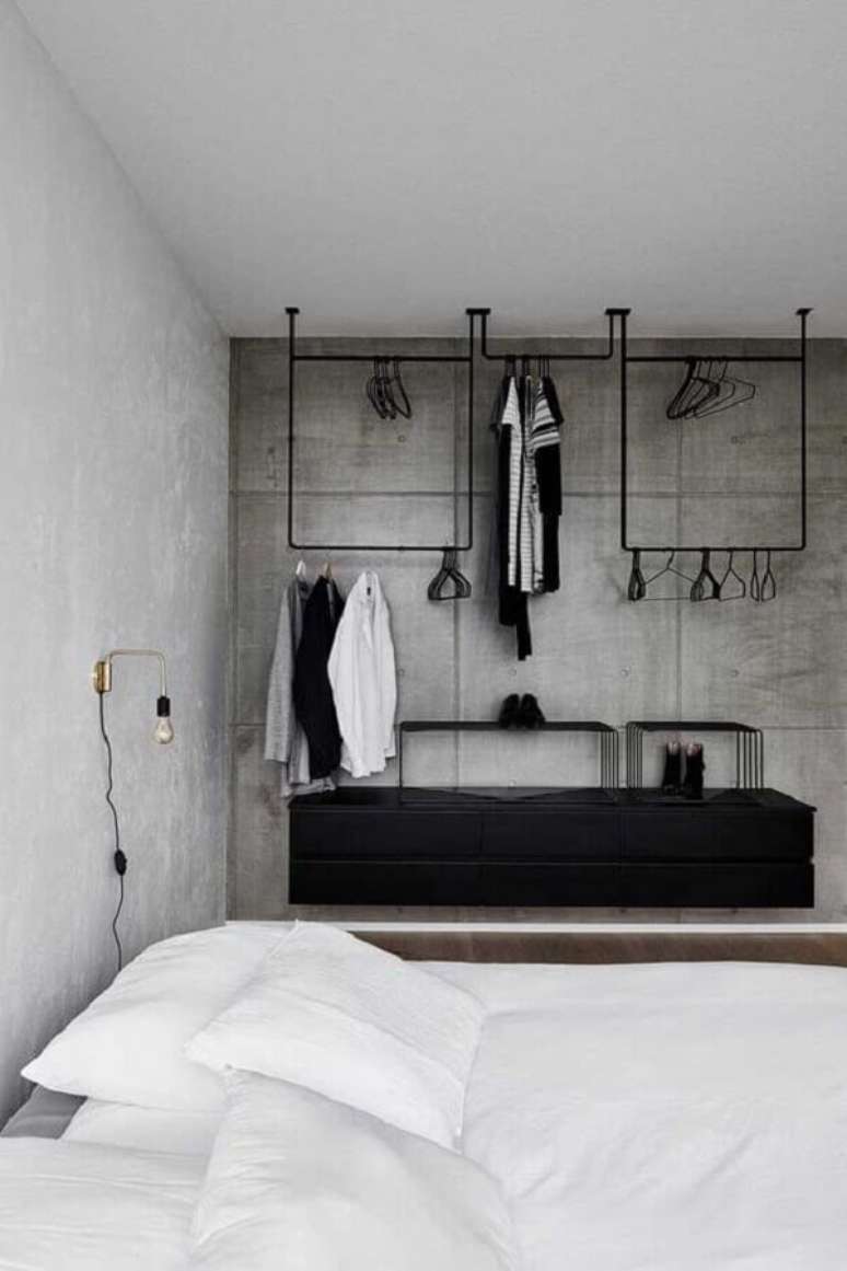 16. Decoração de quarto industrial com móveis pretos – Foto: Pinterest