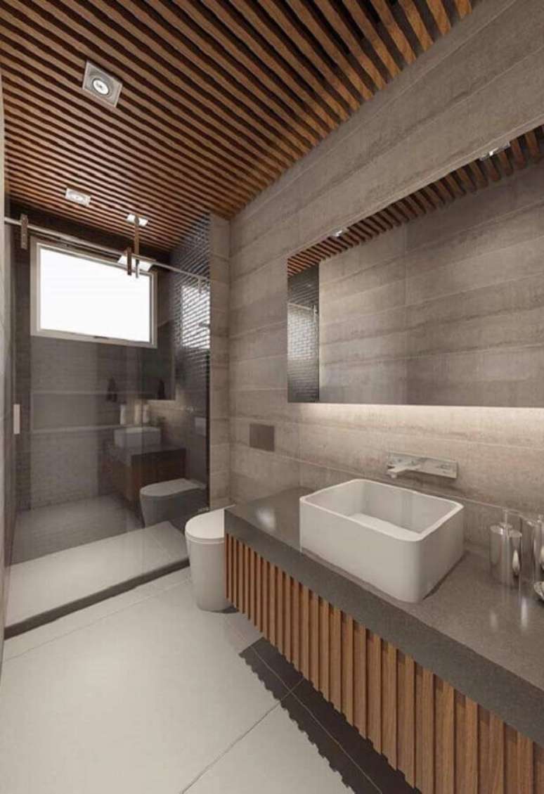 12. Ideias de decoração para banheiro cinza moderno com teto e gabinete de madeira – Foto: Home Fashion Trend