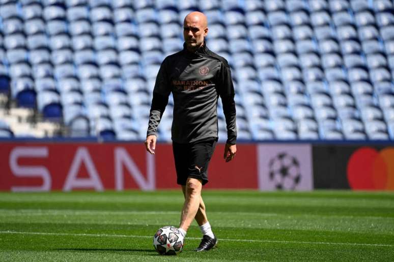 Guardiola não possui boa relação com presidente da La Liga (Foto: PIERRE-PHILIPPE MARCOU / AFP)